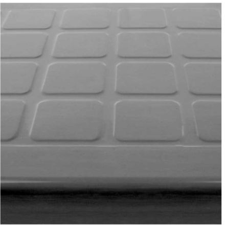 The GS520S raised square pattern rubber stair tread with grit stripping
